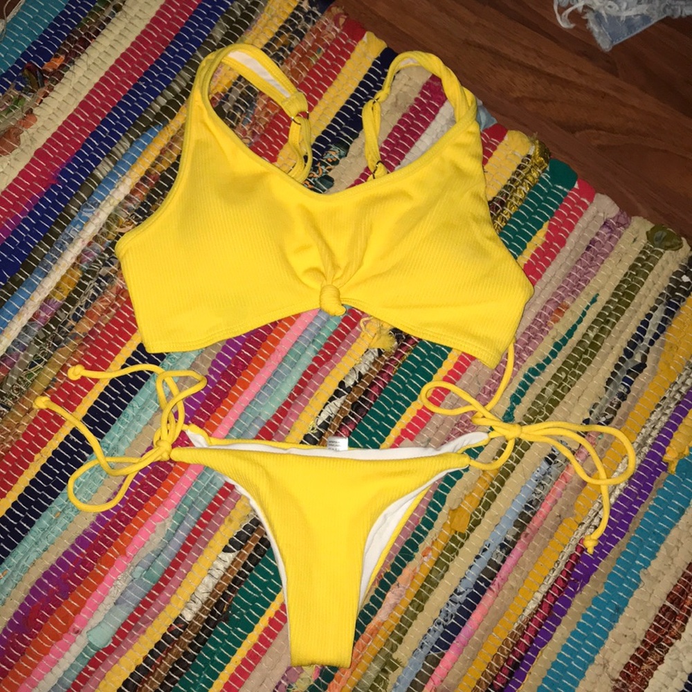 Yellow, cheeky bathing suit! never worn
